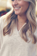 Natural Raw Seam Notched V-Neck Sweater